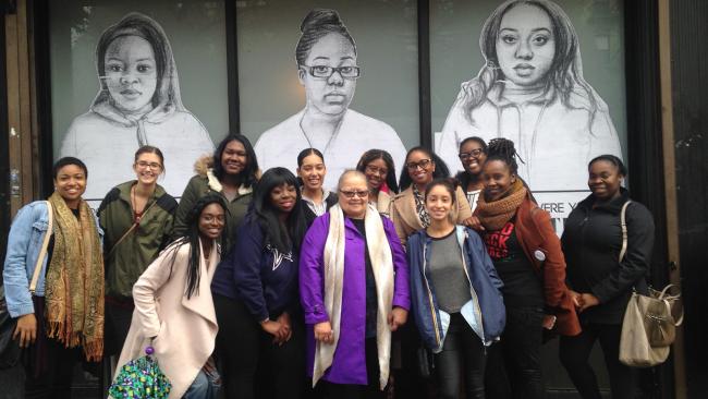A group of people pose at the Black Girl Movement Conference